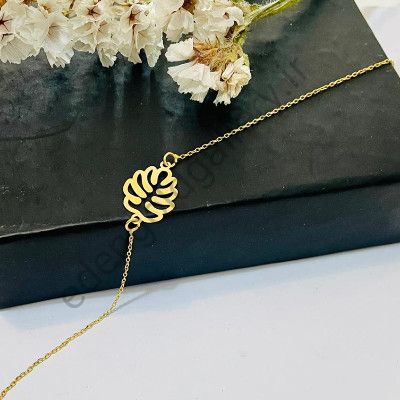 دستبند طرح برگ با زنجیر طلا