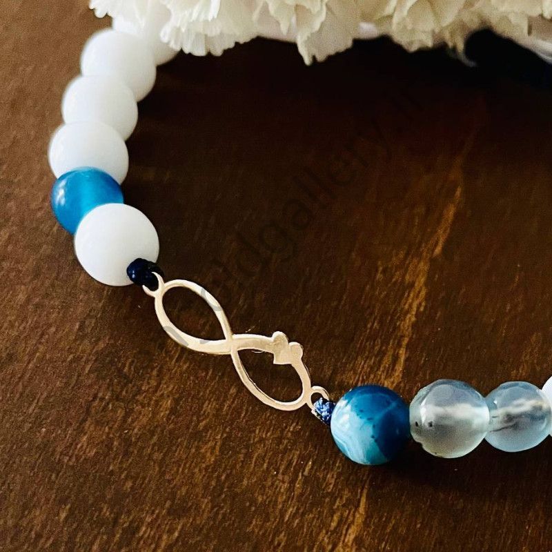 دستبند طرح بینهایت و قلب با بند مهره ای